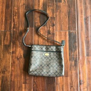 Coach signature shoulder bag.